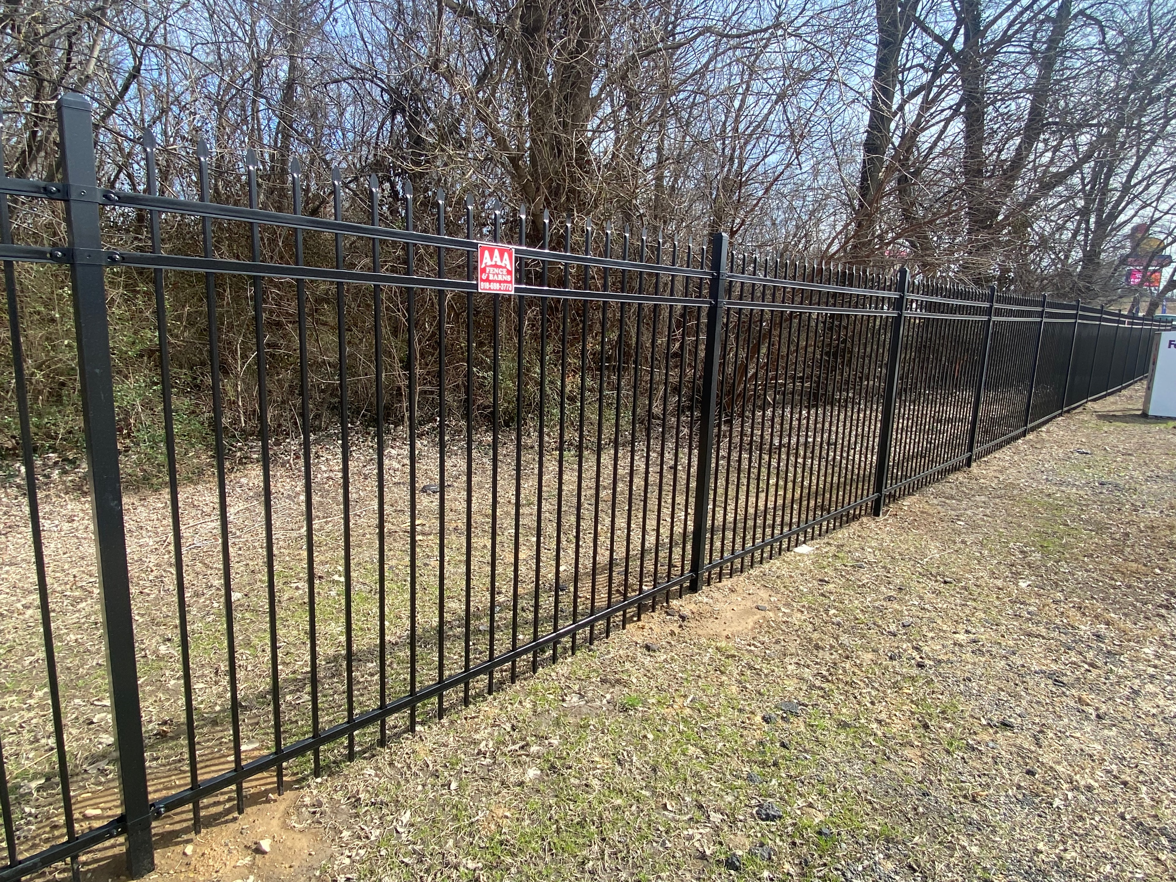 Ornamental rod iron fence installed by AAA Fence & Barns in Tulsa