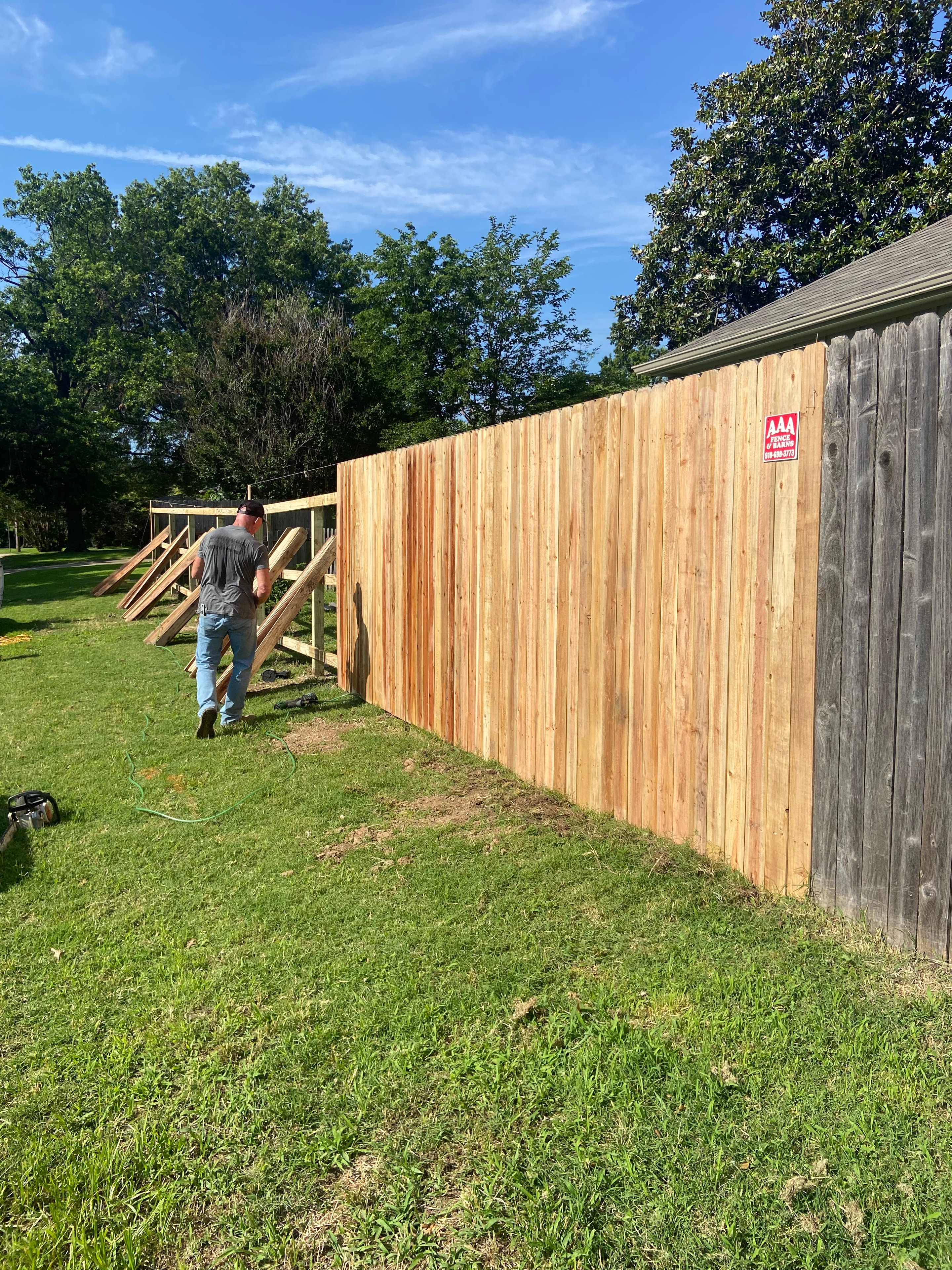 New wood privacy fence installation by AAA Fence & Barns in Tulsa, Oklahoma
